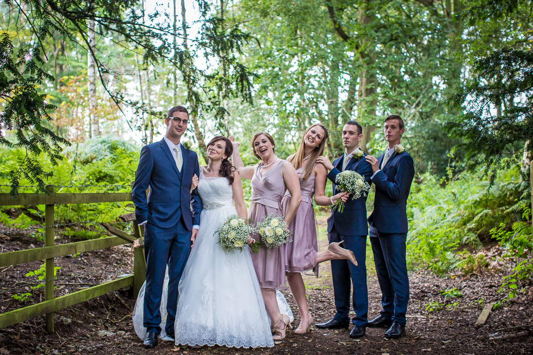Bridal party portraits in woodland