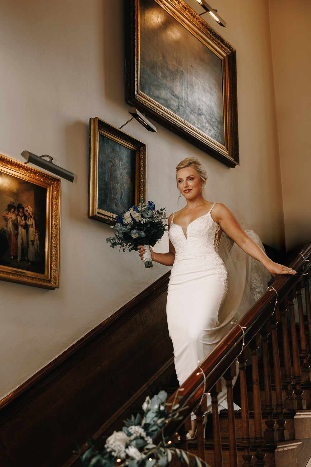 Bride coming down the stairs at Iscoyd Park