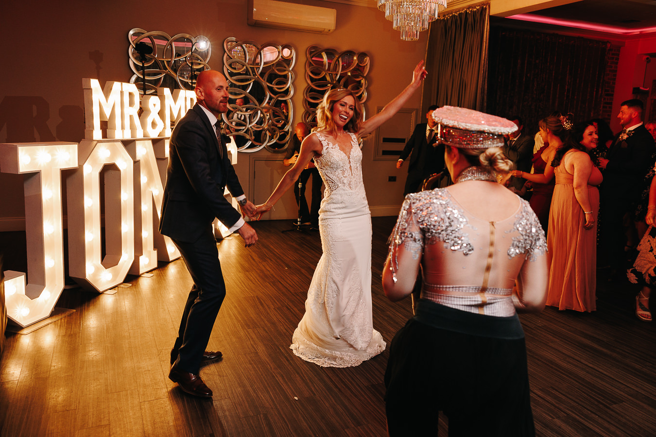 bride and groom dancing to ellie sax