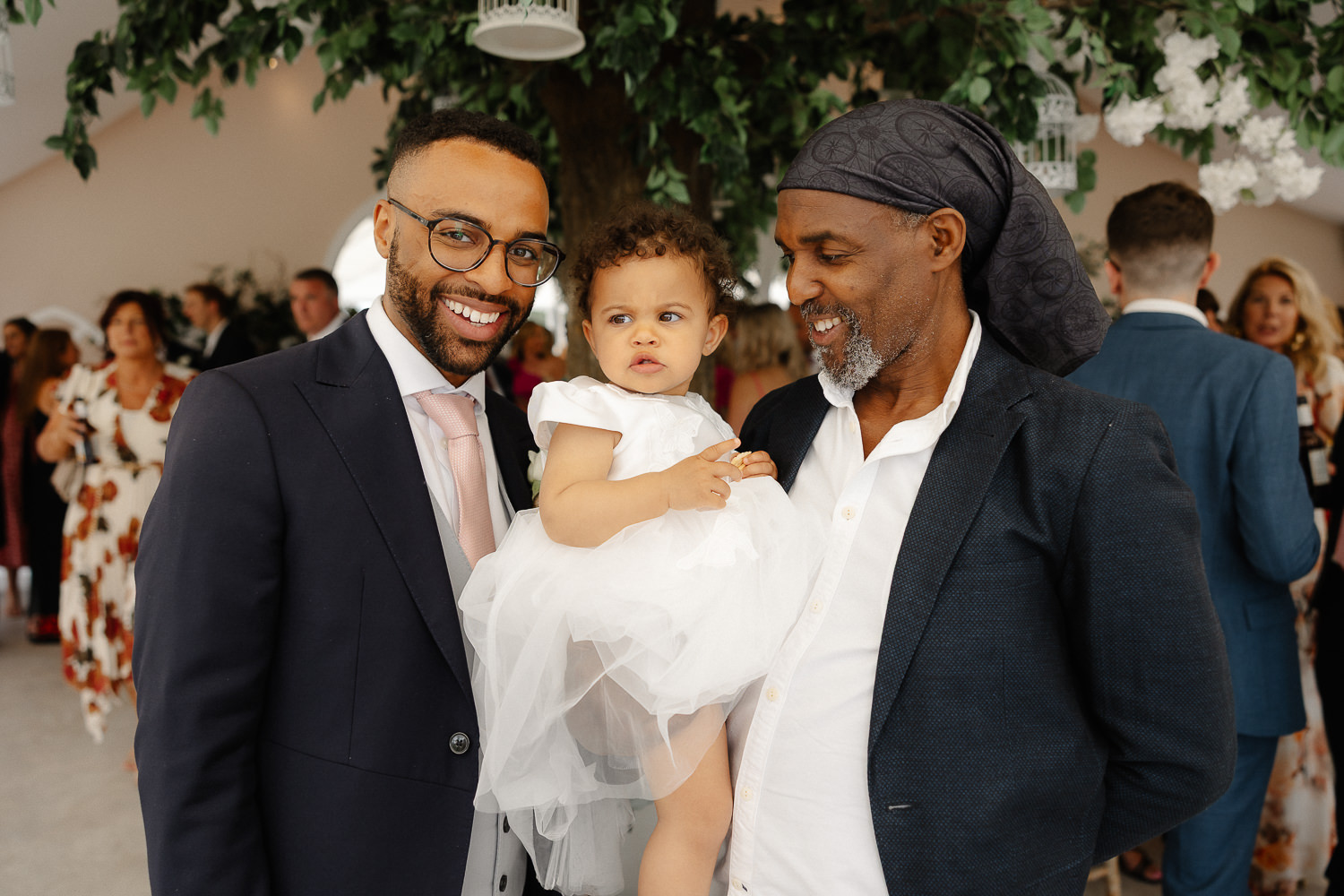 a man holding a baby